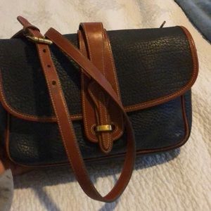 Dooney & Bourke all weather leather navy purse.